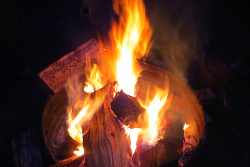 Enjoying a nighttime campfire in Riding Mountain National Park. Photo: Buffy Cowtan