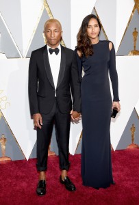 HOLLYWOOD, CA - FEBRUARY 28: Musician Pharrell Williams (L) and Helen Lasichanh attend the 88th Annual Academy Awards at Hollywood & Highland Center on February 28, 2016 in Hollywood, California. (Photo by Ethan Miller/Getty Images)