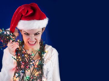 Panicked girl with Christmas lights